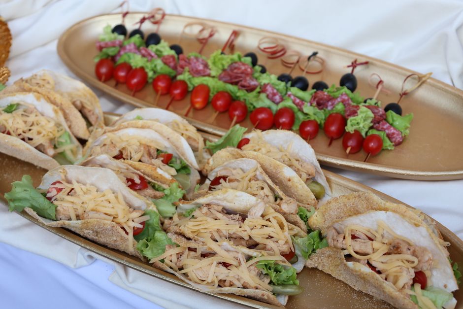 A taco bar set up for a backyard party